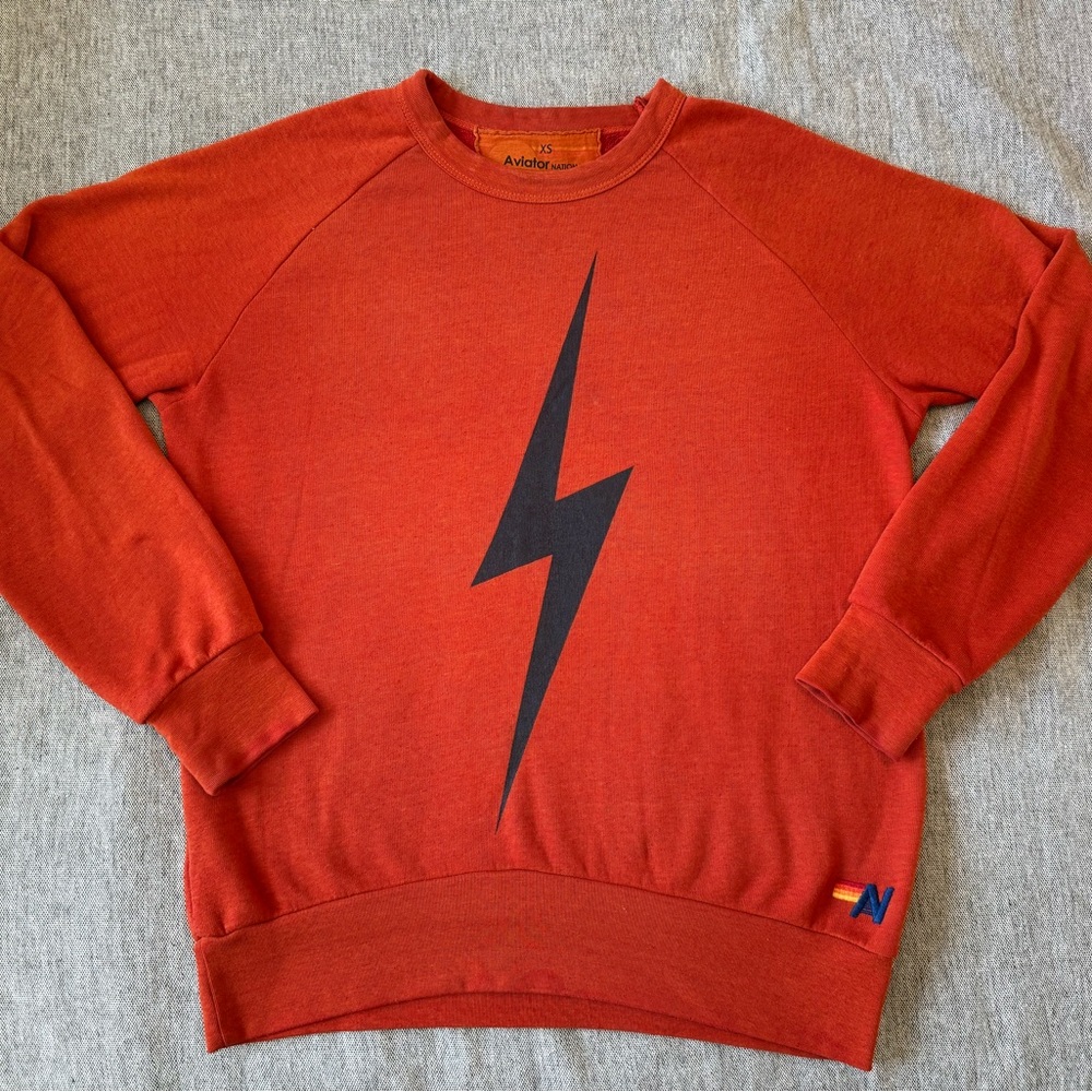 Aviator Nation Orange Sweatshirt with Navy Blue Lightning Bolt